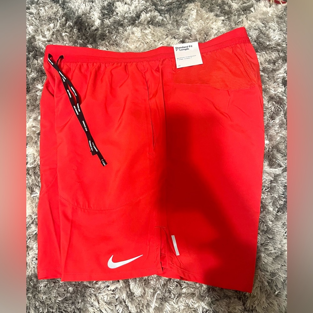 Red Nike shorts